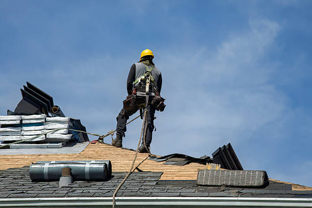 Professional Roof Replacement technician working in East Pembroke, NY